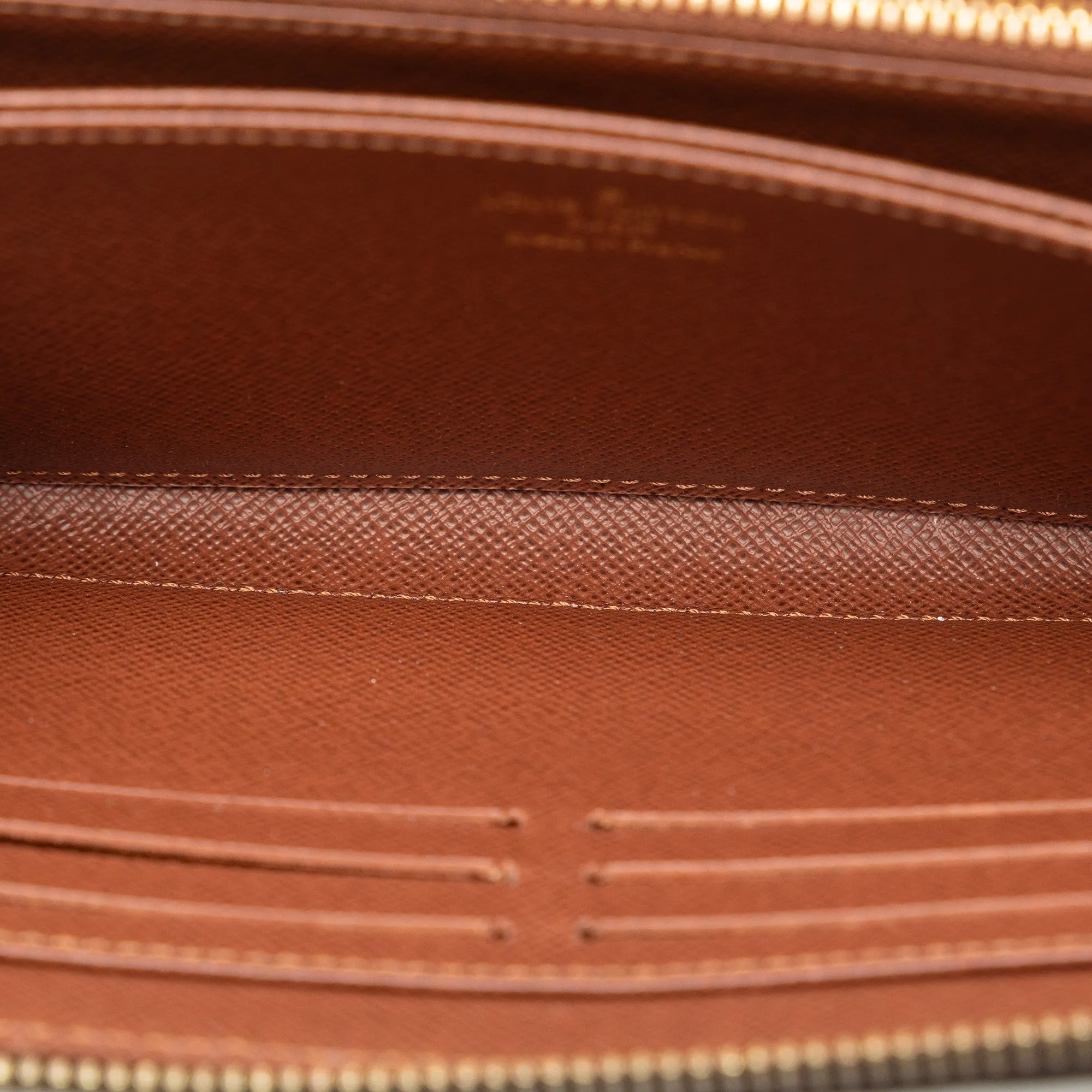 Brown Louis Vuitton Monogram Zippy Wallet