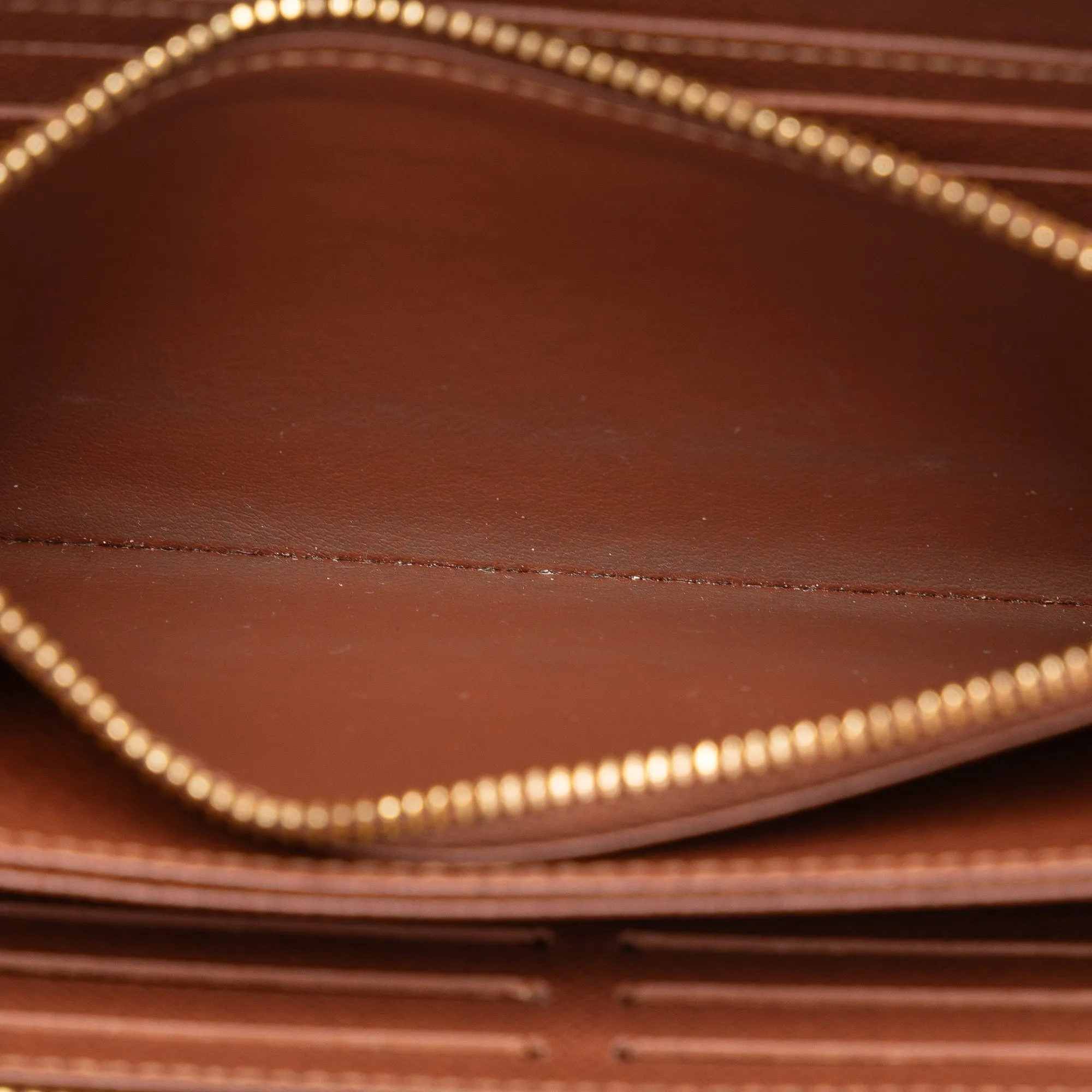 Brown Louis Vuitton Monogram Zippy Wallet