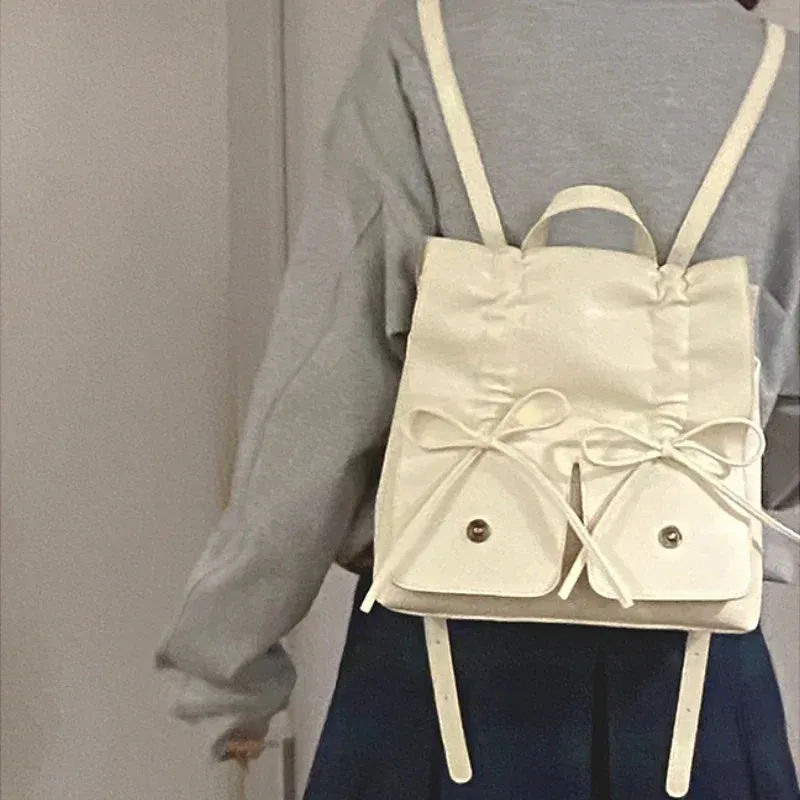 UAKISS  - Girls Sweet Y2k Aesthetic Bow Preppy Backpack All Match Ins Pleated Fashion Backpack Casual Women Students Schoolbags Japanese