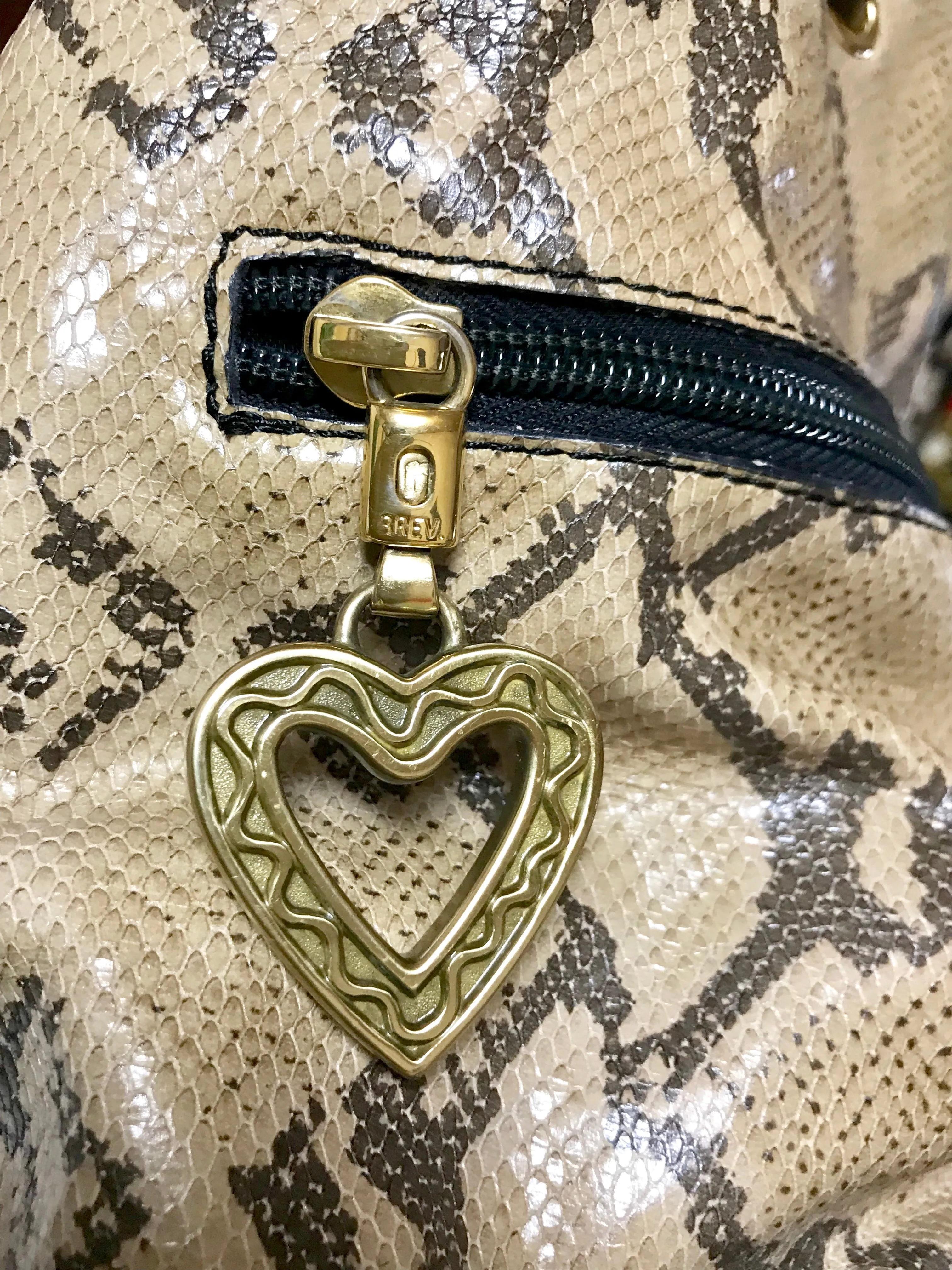 Vintage MOSCHINO by redwall snakeskin print leather mini backpack with golden M logo charm. Perfect chic and mod daily bag. 070131re1